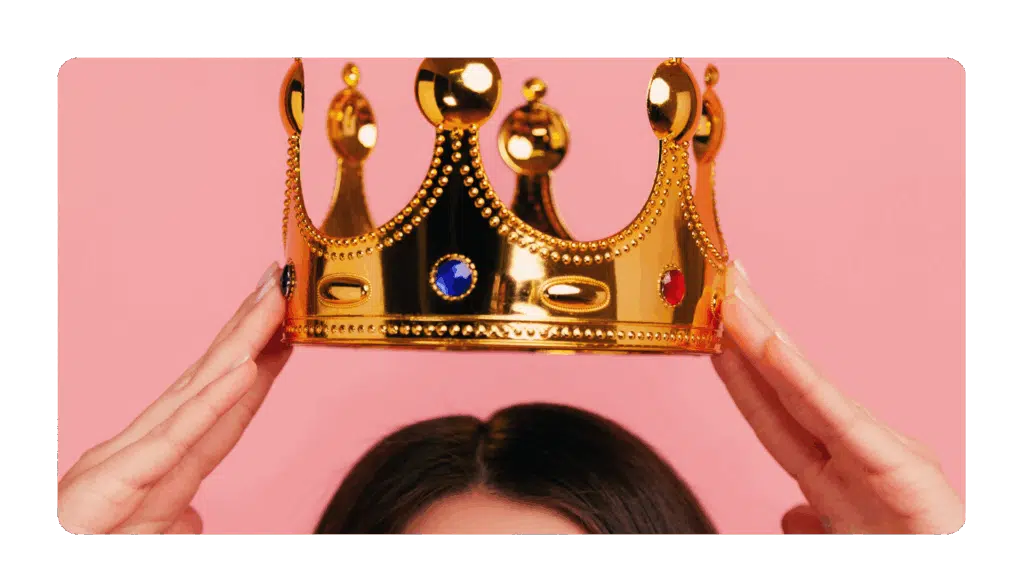 A crown being placed on a leader's head to represent that leadership is a privledge