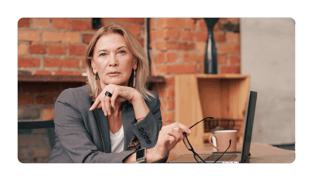 thinking woman representing one of the key personal qualities of a CEO - big picture thinking