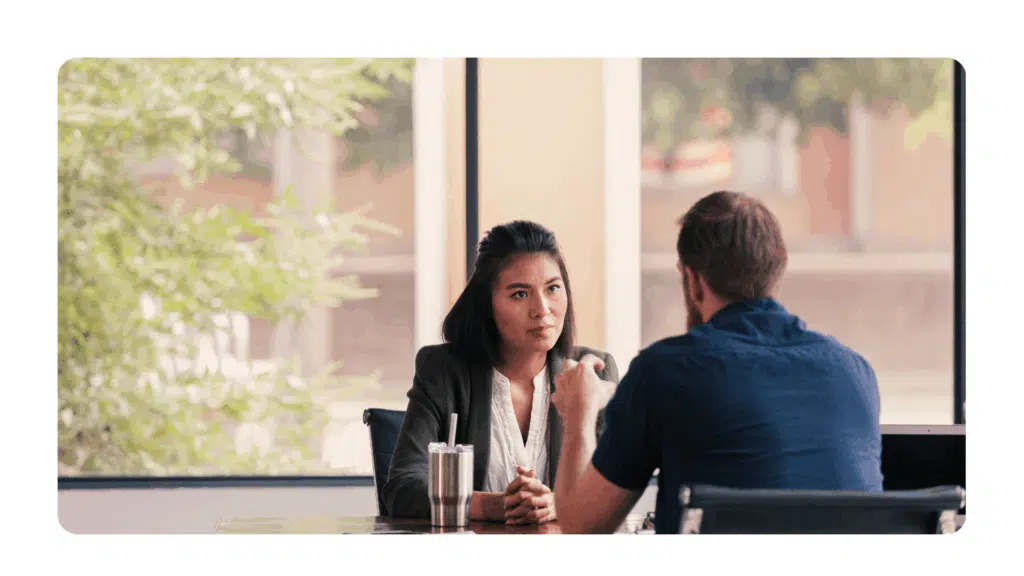 introverted leader listening intently to a colleague