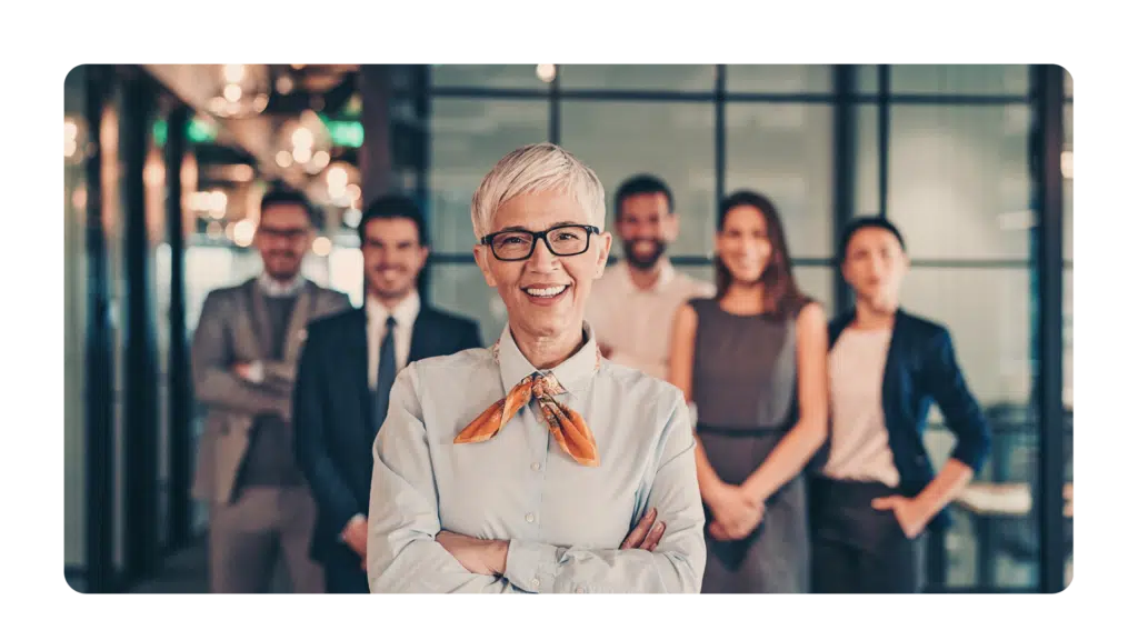 Leaders smiling at camera representing different leadership styles