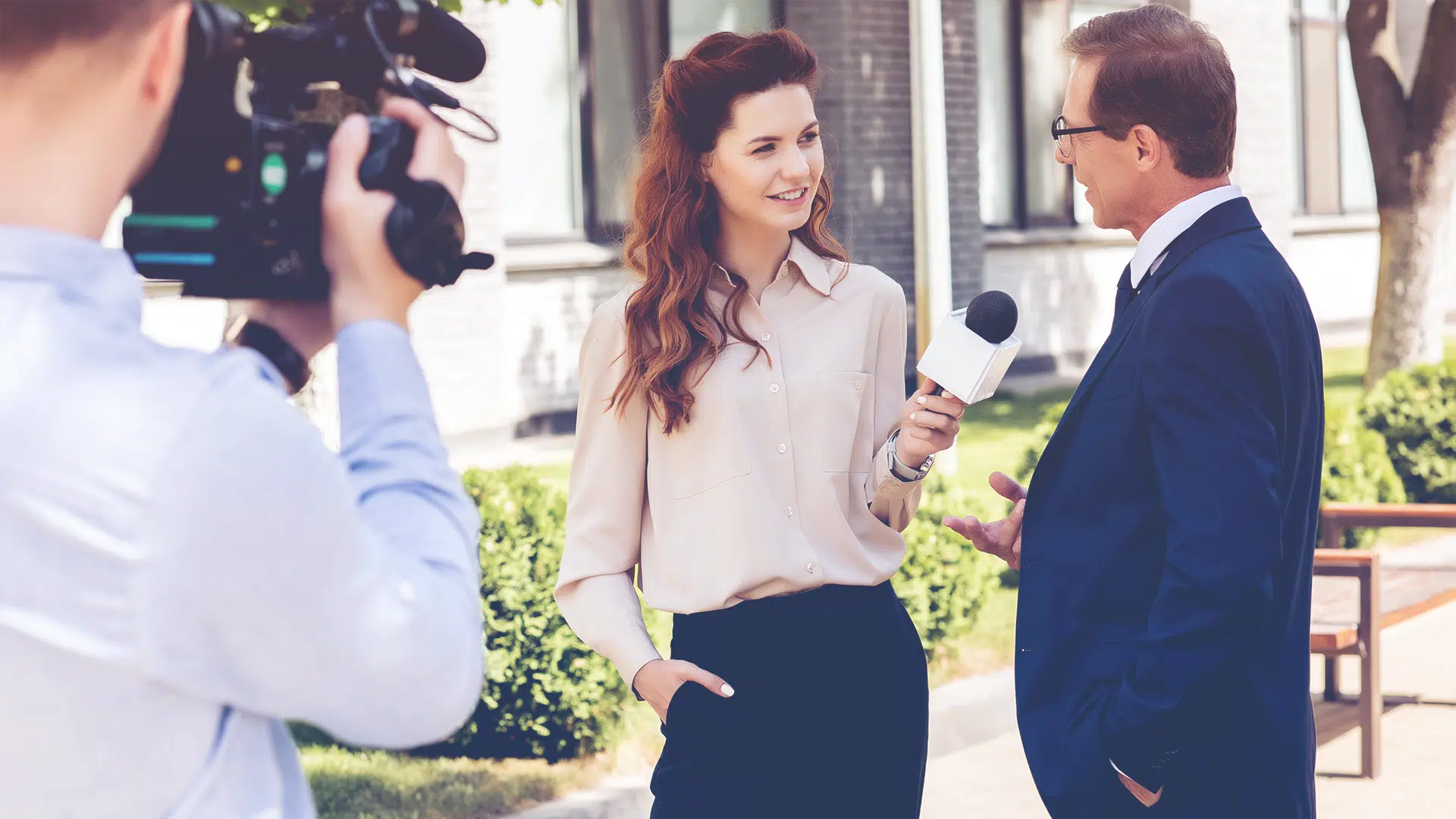 businessman being interviewed who has great executive presence on camera