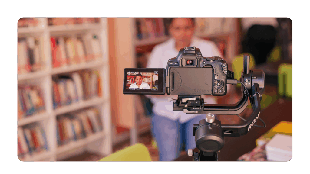 executive with good executive presence on camera speaking in front of personalized background