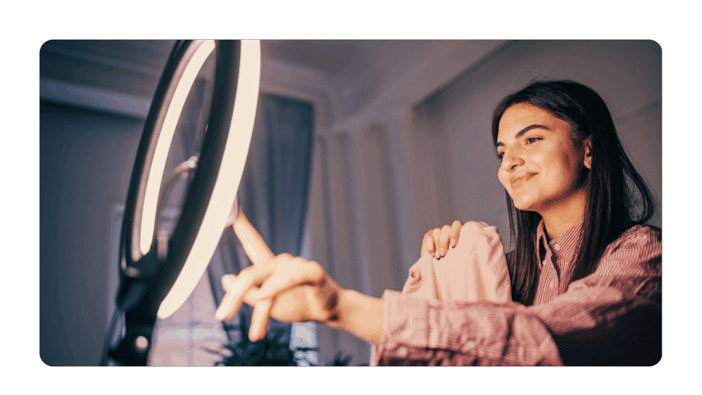 woman using a ring light to ensure a solid executive presence on camera