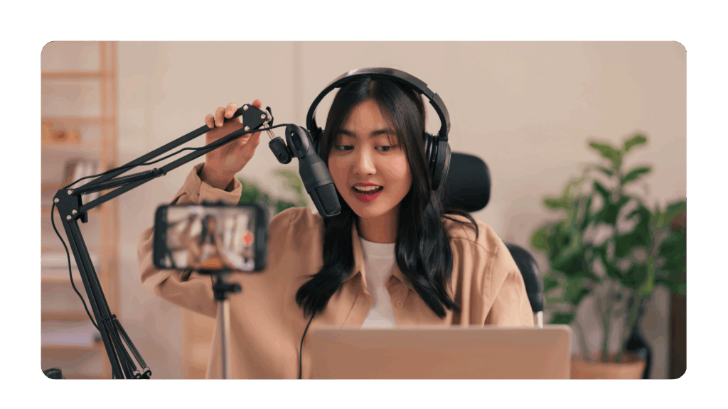 leader with executive presence on camera using microphone
