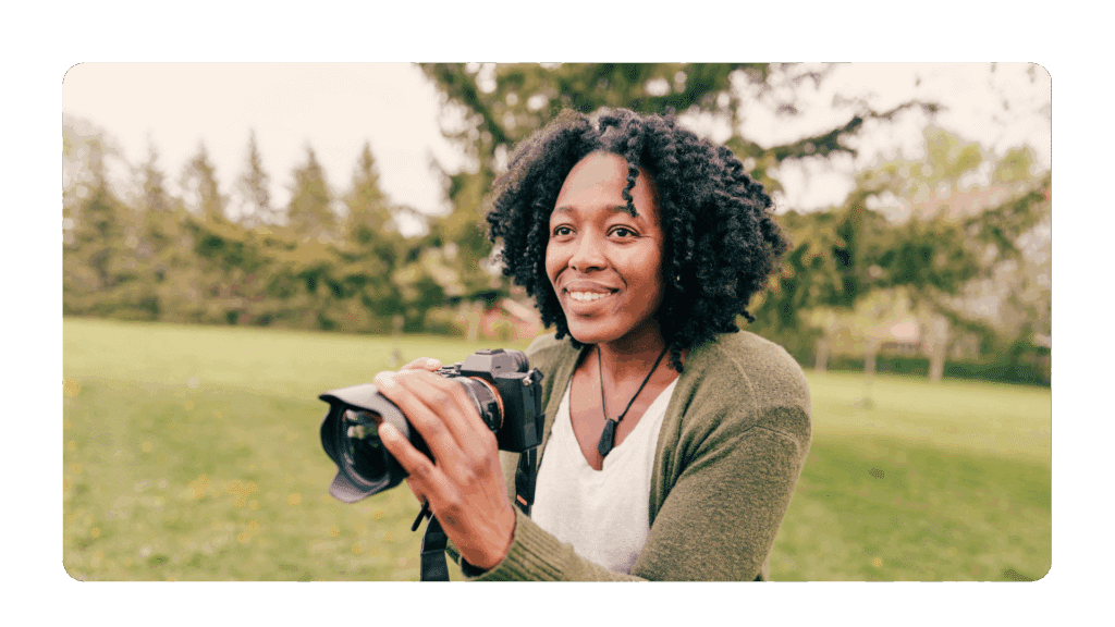 woman with a camera pursuing a side quest in learning in order to stay relevant