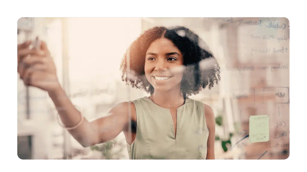 participant in an offsite writing down ideas