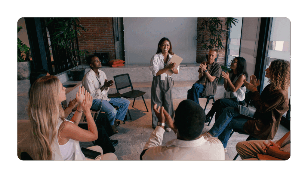 woman speaking about goals at an effective team offsite