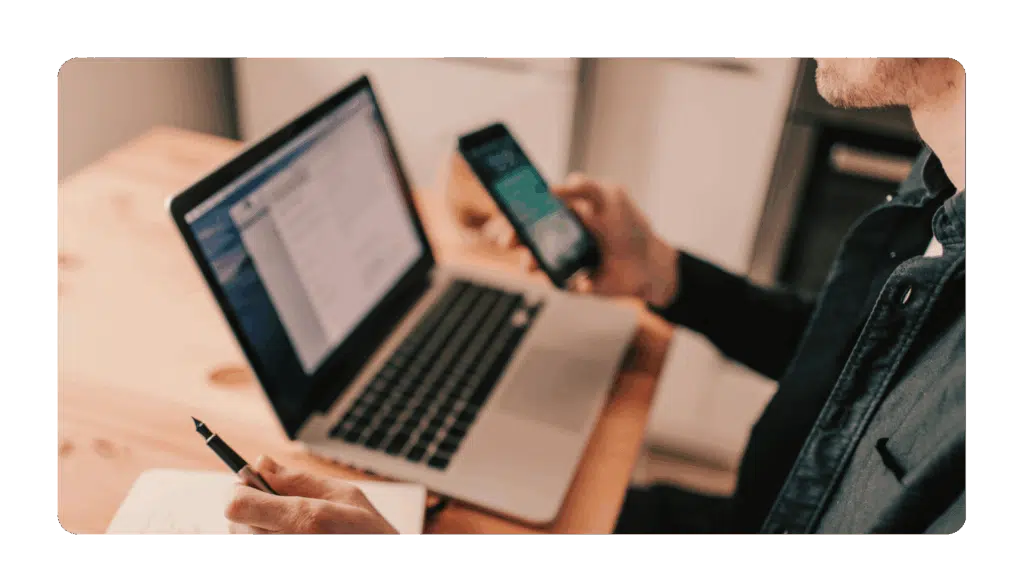 A leader taking heed of leadership lessons from the C-Suite and limiting distractions by turning their phone to silent