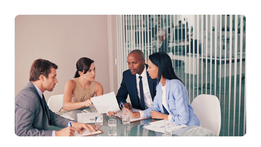 Leader in a meeting helping make decisions to prevent future conflict
